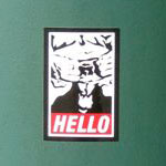hello goatse obey sticker on street post