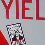 Obey Goatse sticker on yield sign at Hood River in Oregon
